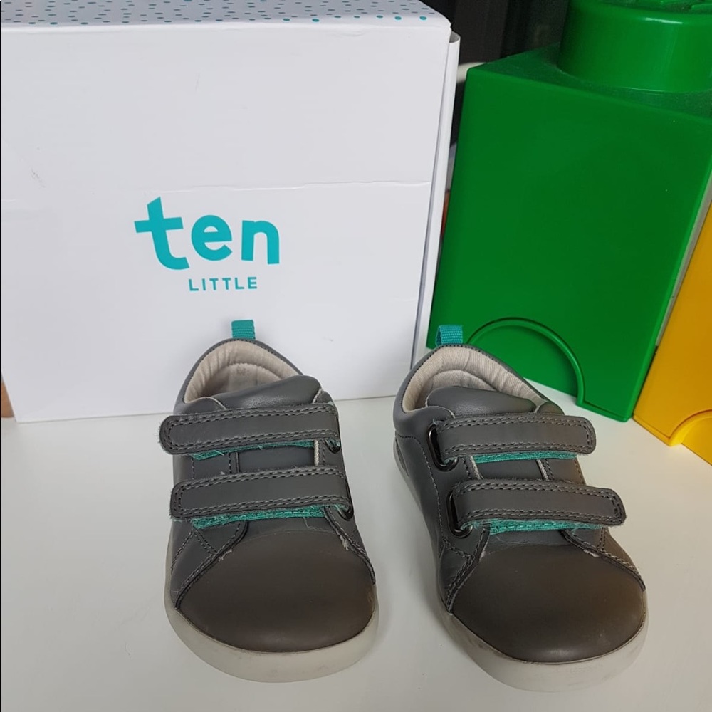 Ten little grey toddler shoes